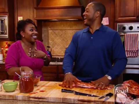 The Neelys prepare Sweet Cola Ribs with a dry rub and homemade barbecue sauce.