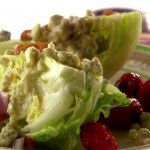 A wedge salad is served.
